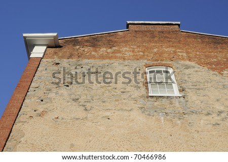 High section of brick wall with blue sky