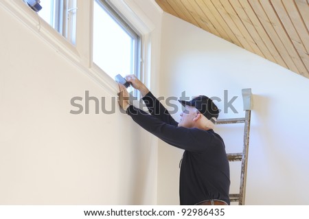 Worker Making House Repairs