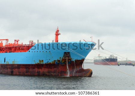 oil tanker and gas ship in the harbor of rotterdam