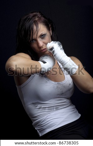 young female fighter ready for boxing