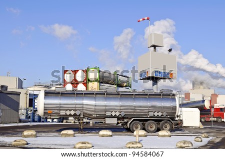 Fuel Tanker Truck in front of container warehouse
