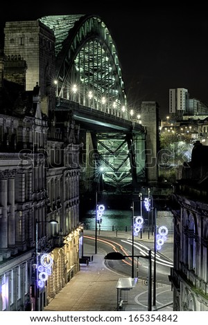 Photograph of the Quayside at Newcastle upon Tyne, England, with the famous Tyne Bridge placed prominently in the photo.