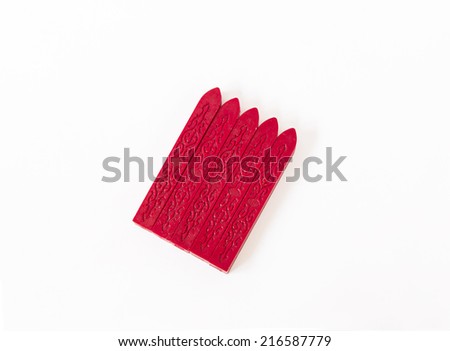 red sealing wax candles isolated on white background with shadow