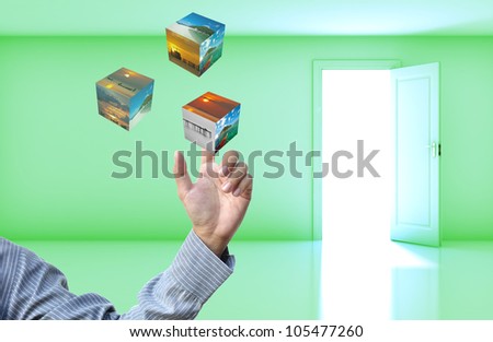 Business concept with business hand on green empty room open door  background.