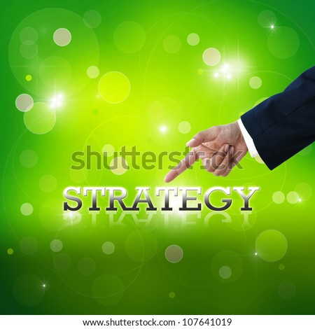 Selecting business hand with business wording on green abstract background.