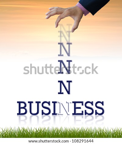 Artwork of business wording with dropping letter from business hand.