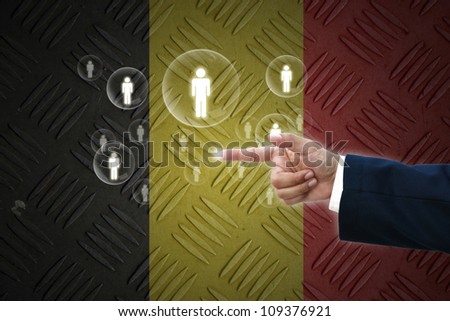 business hand selecting business icon on old Germany  flag background.