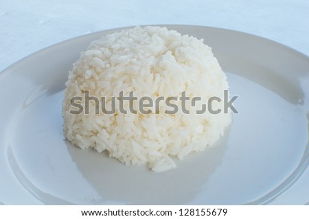 Dish of thai food ; plane steamed rice.