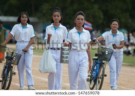 KO SAMUI,SURAT THANI - JULY 17 : Unidentified Thai students 13 - 16 years old in ceremony uniform during sport parade on July 17, 2013 in ko samui, Surat Thani, Thailand.