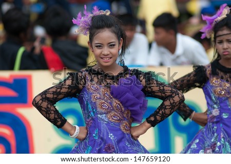 KO SAMUI,SURAT THANI - JULY 17 : Unidentified Thai students 13 - 16 years old cheer leaders in ceremony uniform during sport parade on July 17, 2013 in ko samui, Surat Thani, Thailand.