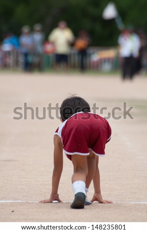 kO SAMUI,SURAT THANI - JULY 18 :Unidentified Thai students 4 - 6 years old athletes in action during sport day on July 18, 2012 in ko samui, Surat Thani, Thailand.