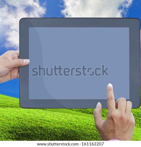 art work hand of business man hold the touch screen computer isolated on white background