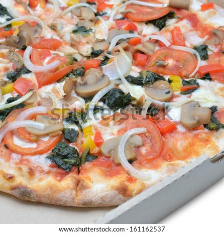 Vegetarian pizza in paper box on white background.