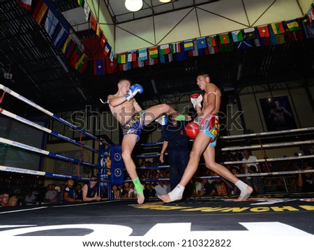 KO SAMUI,SURAT THANI - AUGUST 9 : Unidentified players in action at the third anniversary boxing match at Phetchbuncha Thai boxing stadium  on August 9, 2014 in ko samui, Surat Thani, Thailand.