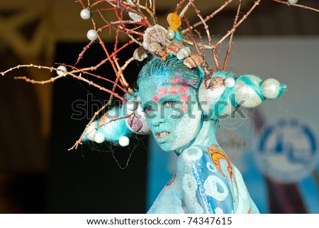 KO SAMUI, THAILAND - MARCH 26: Model at the Samui International Body Painting Festival on March 26, 2011 in Ko Samui island, Thailand. This is the first body painting festival in Asia.