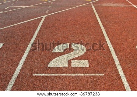 Running track number at sport stadium.