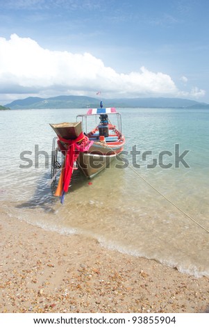 A longtail boat for tourist daily rental to the island at the beach.