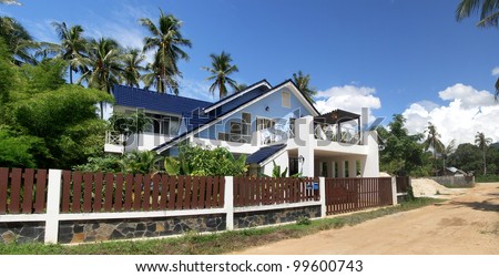 panoramic view of modern house with blue sky.