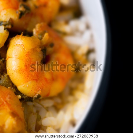 Caribbean tasty curry shrimp prawns and white rice