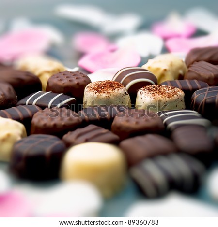 Chocolate truffles and rose petals