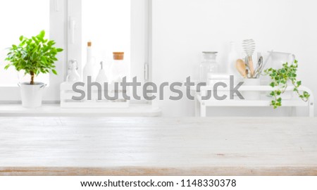 Tabletop for product display with defocused modern pastel kitchen background
