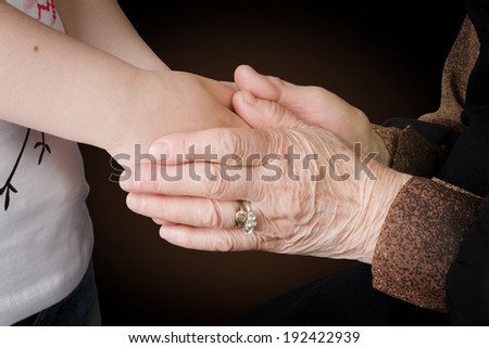 Help concept, young and elder hands