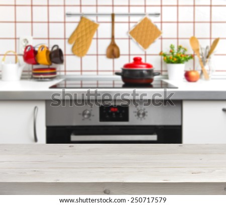 Wood texture table on defocused kitchen bench background