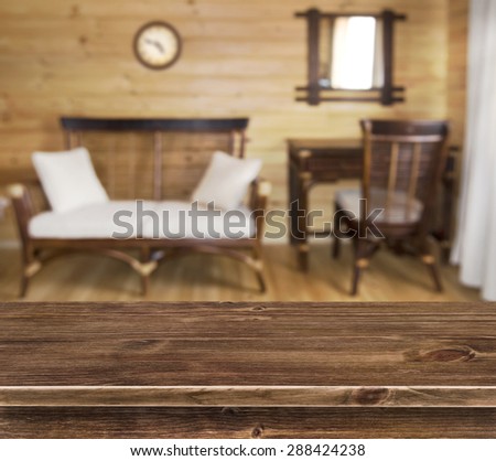 Table surface over elegant wooden furniture background