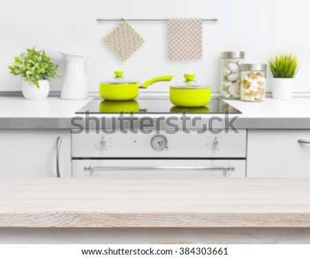Wood texture table on defocused kitchen bench background