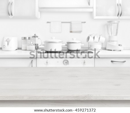 Wooden table on white modern kitchen interior background, pastel colors