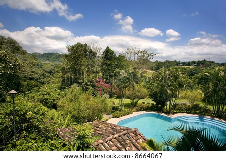 a swiming pool in a tropical setting  in  Costa Rica