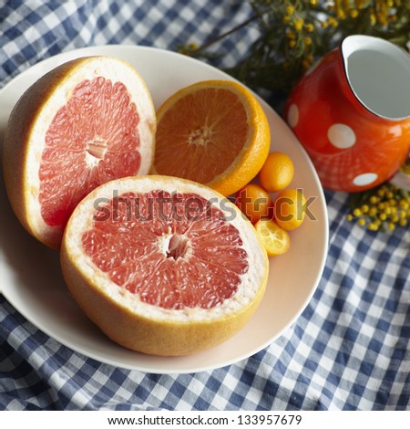 ripe citrus on  table with natural lighting
