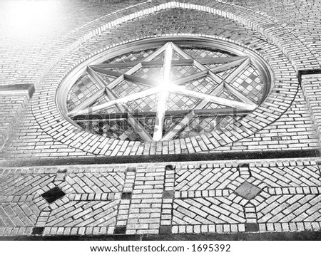 didgitally enhanced photograph of a window showing the star of david as well as the peace sign