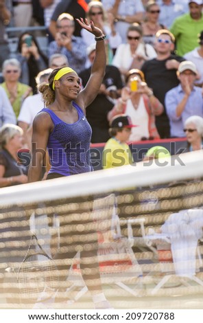 MONTREAL - AUGUST 7: Serena Williams greets fans right after the victory against Lucie Safarova for the 3rd round of the Rogers Cup 2014 in Montreal.