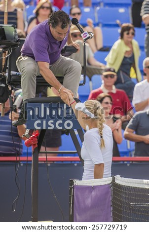 MONTREAL - AUGUST 5: Caroline Wozniacki of Denmark in her Second round match win over Daniela Hantuchova of Slovakia at the 2014 Rogers Cup on August 5, 2014 in Montreal, Canada