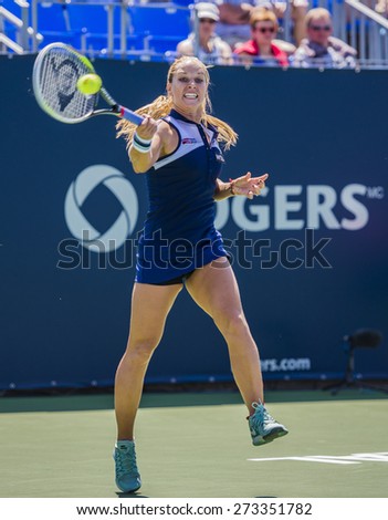 MONTREAL - AUGUST 6: Dominika Cibulkova of Slovakia in her Second round match against Heather Watson of United Kingdom at the 2014 Rogers Cup on August 6, 2014 in Montreal, Canada