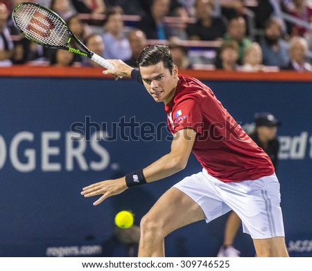 MONTREAL - AUGUST 11: Milos Raonic of Canada during his second round match loss to Ivo Karlovic of Croatia at the 2015 Rogers Cup on August 11, 2015 in Montreal, Canada