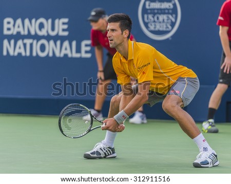 MONTREAL - AUGUST 11: Novak Djokovic of Serbia  during his second round match win over Thomaz Bellucci of Brazil  at the 2015 Rogers Cup on August 11, 2015 in Montreal, Canada