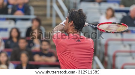 MONTREAL - AUGUST 11: Thomaz Bellucci of Brazil during his second round match loss to Novak Djokovic of Serbia at the 2015 Rogers Cup on August 11, 2015 in Montreal, Canada