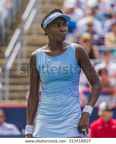 MONTREAL - AUGUST 9: Venus Williams of USA in her semi final match win over Serena Williams of USA at the 2014 Rogers Cup on August 9, 2014 in Montreal, Canada