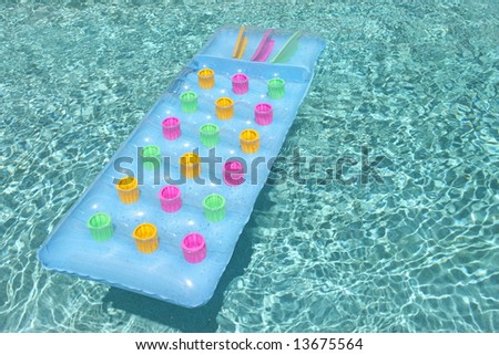 colorful pool toy floating in water