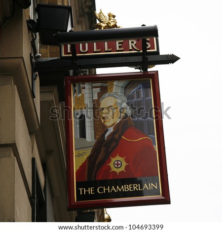 LONDON - APRIL 30: English pub sign, Public house, known as pub, is focal point of community, on April 30, 2012, London, UK. Pub business, now about 53,500 pubs in UK, has been declining every year