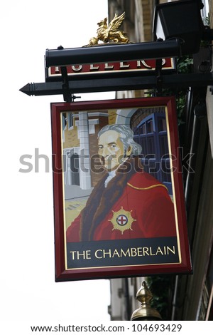 LONDON - APRIL 30: English pub sign, Public house, known as pub, is focal point of community, on April 30, 2012, London, UK. Pub business, now about 53,500 pubs in UK, has been declining every year