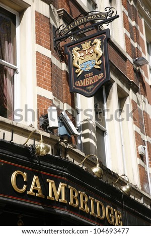 LONDON - APRIL 15: English pub sign, Public house, known as pub, is focal point of community, on April 15, 2012, London, UK. Pub business, now about 53,500 pubs in UK, has been declining every year