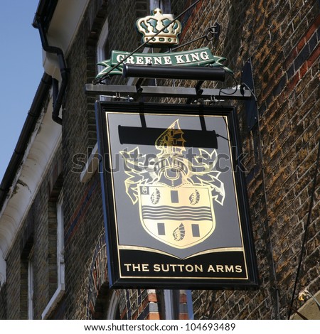 LONDON - APRIL 1: English pub sign, Public house, known as pub, is focal point of community, on April 1, 2012, London, UK. Pub business, now about 53,500 pubs in UK, has been declining every year