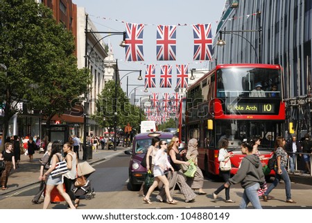 LONDON - MAY 24: Oxford Street in London, decorated with union jack flags to celebrate the Queen\'s diamond Jubilee on May 24, 2012 in London. The main celebrations held from June 2 to June 5
