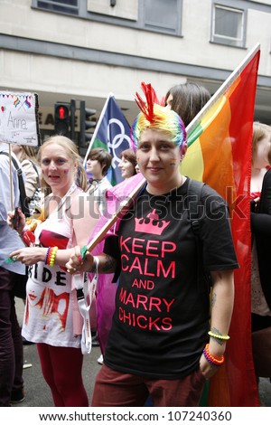 LONDON - JULY 7: People take part in London's Gay Pride, 2012 Worldpride on July 7, 2012 in London, UK, estimated 25,000 people took part in the march, Parade to support gay rights.