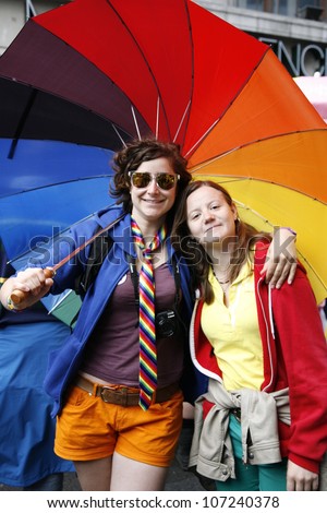 LONDON - JULY 7: People take part in London's Gay Pride, 2012 Worldpride on July 7, 2012 in London, UK, estimated 25,000 people took part in the march, Parade to support gay rights.