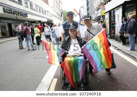 LONDON - JULY 7: People take part in London\'s Gay Pride, 2012 Worldpride on July 7, 2012 in London, UK, estimated 25,000 people took part in the march, Parade to support gay rights.