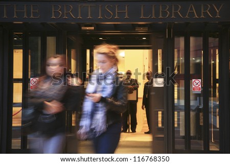 LONDON - NOV 1 : People coming out of British Library building, national library of the UK, designed by professor Colin Wilson, separated from British Museum in 1973 on November 1, 2010, London, UK.